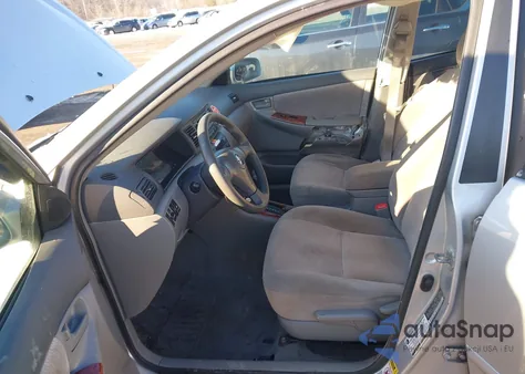 2005 Toyota Corolla Le z USA, uszkodzony, nr VIN 2T1BR30E85C338898